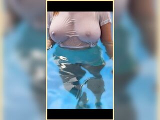 Wifey soaked shirt in the pool with flawless braless breasts