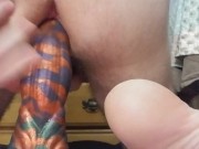 Twink bounces on bad dragon