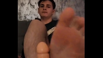 Giving you a footjob and a blowjob