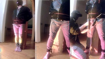 pee desperation: tied up by his flatmate, this guy tries to resist while his cock and balls are played with. He gets a boner and finally wets himself