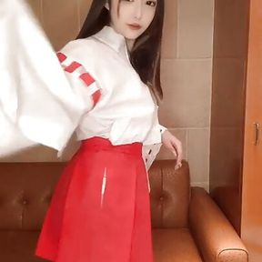 Changing live into a miko (shrine maiden) costume