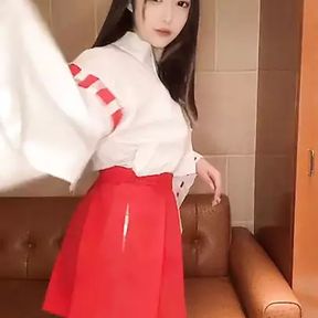 Changing live into a miko (shrine maiden) costume