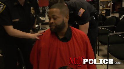 Curvy female cops barge into barbershop to arrest a criminal