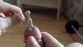 Jizz shot thru bone urethral buttplug with dick-head ring (slow-mo pop-shot)