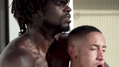 Black stud with a big cock and buff muscles fucks a guy doggy style