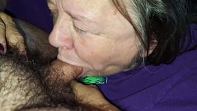 Neighbour's sexy granny GF gives a great blowjob sitting on the couch.