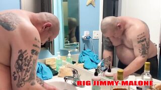 Big Jimmy Malone's shaved balls are the perfect breeding ground for his cum