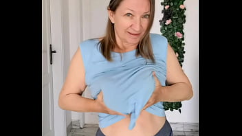 Braless GILF shaking huge tits