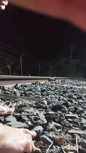 Naked and Pissing on the Train Tracks