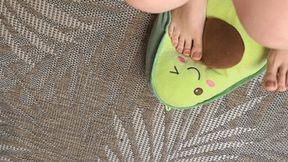 The woman is kneading her favorite toy with her feet