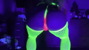 Blacklight Striptease with LucyL'Vette in a hot pink slingshot