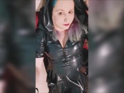 Blonde girl in blue latex dress