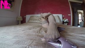 Seducing in rose lingerie and nude stockings