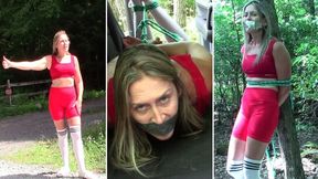 Sinthia- Hitchhiker In Red Gym Shorts, Duct Tape Gag, Tied To Tree