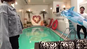 Beautiful girl gives a blowjob and squirts on a poolside love hotel