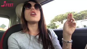 Petra smoking in car