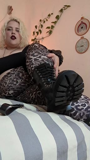 Sexy blonde woman in leopard print lingerie
