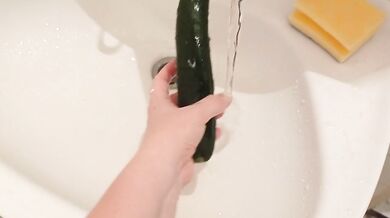 The fast game with the cucumber like a dildo after shoping