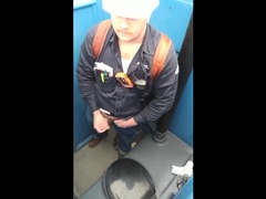 Bearded Hunk Strokes Cock Outdoors in a Porty Potty