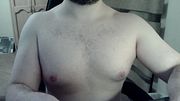 Hot beefy virgin camboy shows off the goods during a show