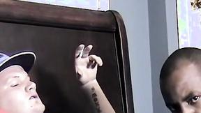 ”Ebony guy sucks a big white prick till it cums”