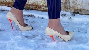 high heels walking on slippery snow, high heels sliding on ice, high heels walking snow