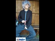young guy having fun at the bus stop