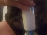 Rubbing my clit with my wand while riding my dildo.
