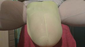 Bulging with filled condom