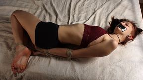 Tapegagged barefoot Kim, dressed in bra and panties, hogtied with her elbows tightly tied together, is tickled by a man (HD MP4)