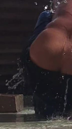 Indian village desi open bathroom Bhabhi ji bathing in the bathroom outside the house   Clip 1