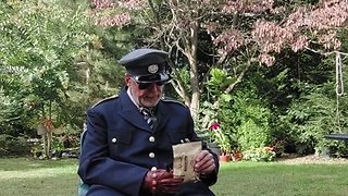 Military officer relaxes with pipe smoking