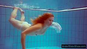 Redhead In A White Dress And Sexy Bikini
