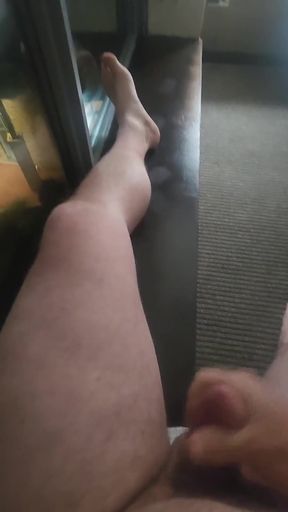 Jerkin While Nude in the Hotel Window