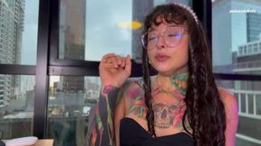 A nerdy girl with glasses sneezes on your dick