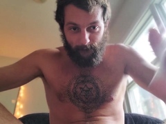 Bearded stud Andre Grey fingers his ass