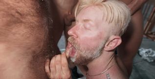 Blonde male receives plenty of dicks to play with during naked gay gangbang