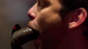 ”Two horny guys blowing each others dicks through glory hole”