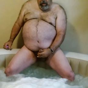 Sitting on the edge of the jacuzzi and cumming. JohnGalt 060769