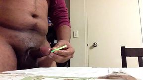 Glowstick insertion into a penis.MOV