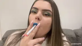 Play with Smoke featuring a girl with light blue lipstick.