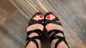 Toe Wiggling In Black Strappy Sandals