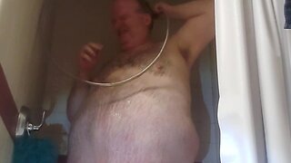Chubby man takes a shower at the office: work and showering