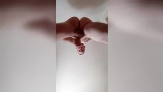 Swiss twink strokes his big cock upside down and shoots close up