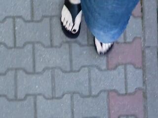 I show my feet during a morning walk around the neighborhood