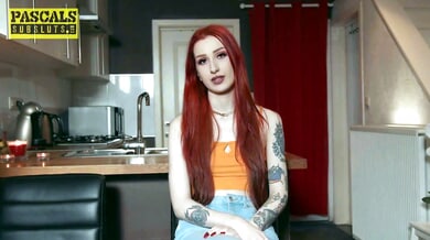 Tattooed British submissive Gigi Rouge worships her dominant's cock on her knees