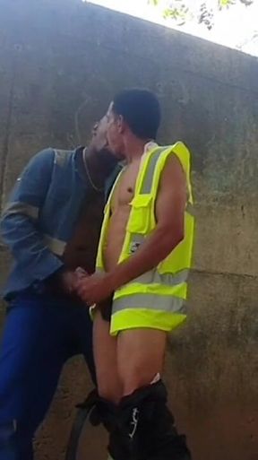 Two Workers Behind the Service Wall