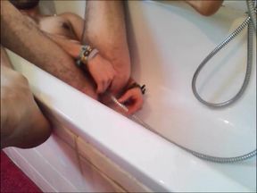 Twink Uses Shower Head for Enema and Masturbates
