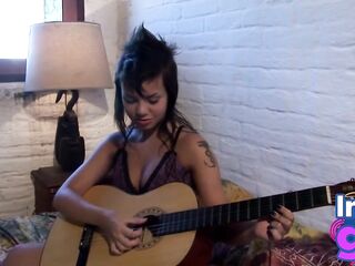Sexy Paul showing her medium boobs and snatch with guitar