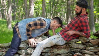 The Territory men take a break on a pile of rocks